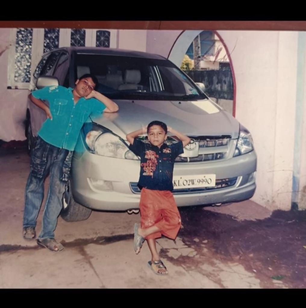 Childhood photo of Vishnu Dethan and Krishna Dethan with Toyota Innova in Kerala
